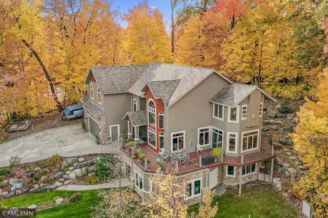 exterior space featuring a wooded view
