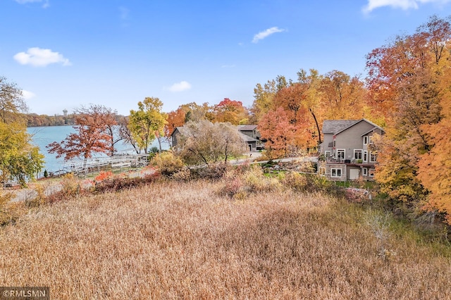 view of yard with a water view