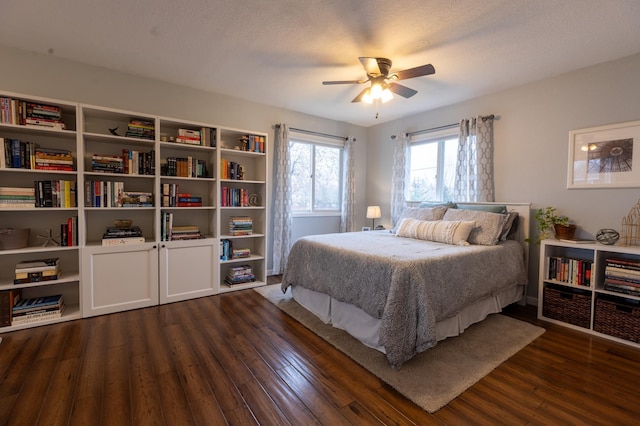 bedroom featuring ceiling fan and wood finished floors