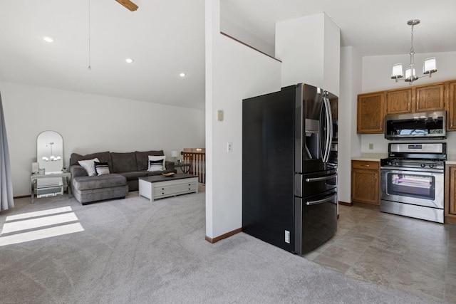 kitchen with light colored carpet, brown cabinets, high vaulted ceiling, an inviting chandelier, and stainless steel appliances