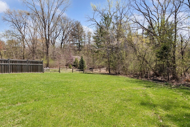 view of yard with fence