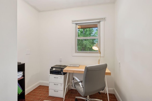 office space featuring baseboards and ornamental molding