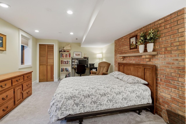 bedroom featuring light colored carpet, recessed lighting, a brick fireplace, and baseboards