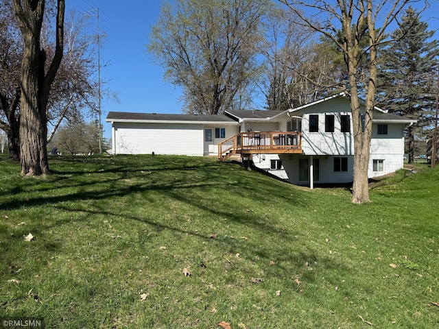 view of front of house featuring a wooden deck and a front lawn