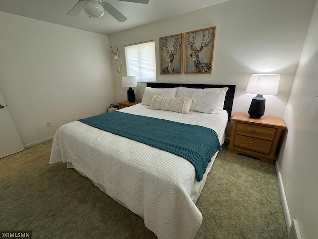bedroom with carpet, baseboards, and a ceiling fan