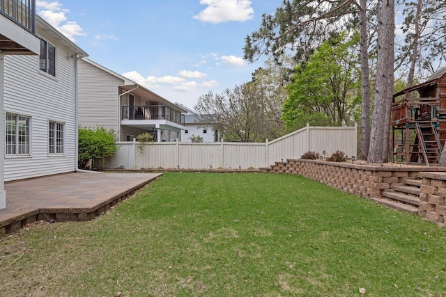 view of yard with a fenced backyard
