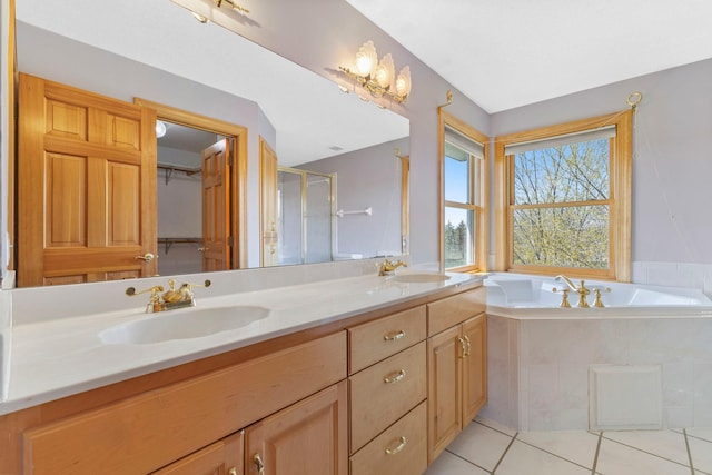 3088 Canyon Rd, Chaska, MN 55318 - full bathroom with a sink, tile patterned flooring, a stall shower, and double vanity