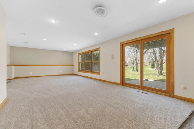 3088 Canyon Rd, Chaska, MN 55318 - unfurnished living room featuring baseboards, carpet flooring, recessed lighting, and visible vents