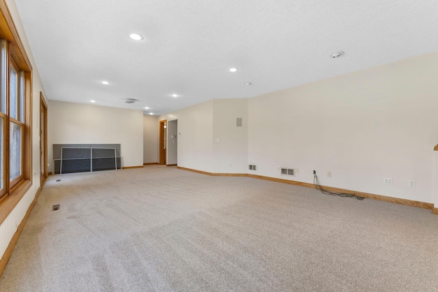 3088 Canyon Rd, Chaska, MN 55318 - interior space featuring baseboards, light carpet, recessed lighting, and visible vents