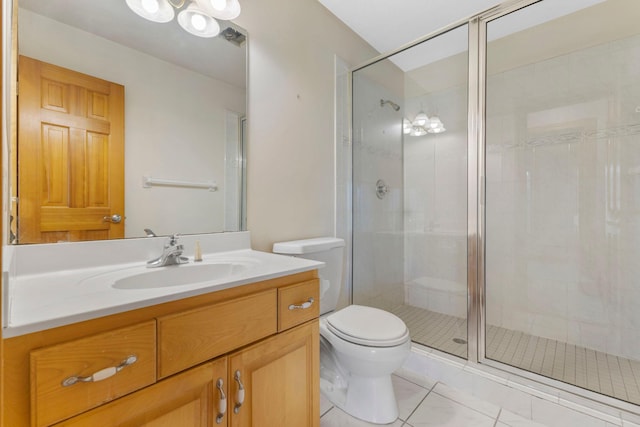 3088 Canyon Rd, Chaska, MN 55318 - bathroom with tile patterned flooring, a stall shower, toilet, and vanity