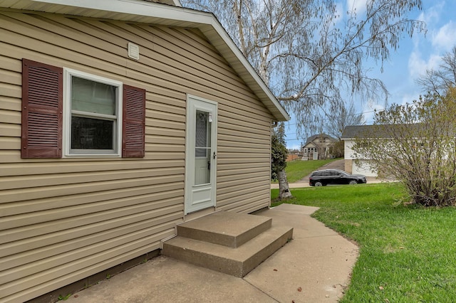 224 Spring St, Holdingford, MN 56340 - view of home's exterior featuring a yard