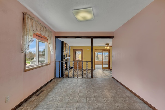 224 Spring St, Holdingford, MN 56340 - empty room with baseboards and ceiling fan