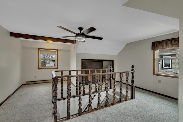 224 Spring St, Holdingford, MN 56340 - additional living space featuring a ceiling fan, lofted ceiling, a baseboard radiator, baseboards, and carpet floors