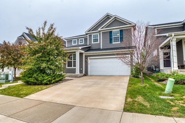 15637 Eddy Creek Way, Apple Valley, MN 55124 - view of front of property with a garage, a front yard, and concrete driveway