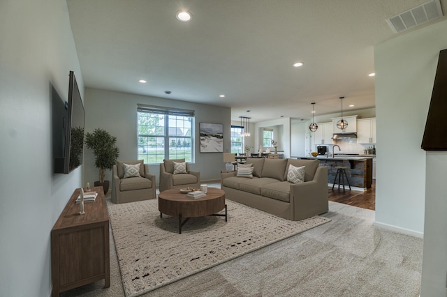 15637 Eddy Creek Way, Apple Valley, MN 55124 - living area with carpet, recessed lighting, and baseboards