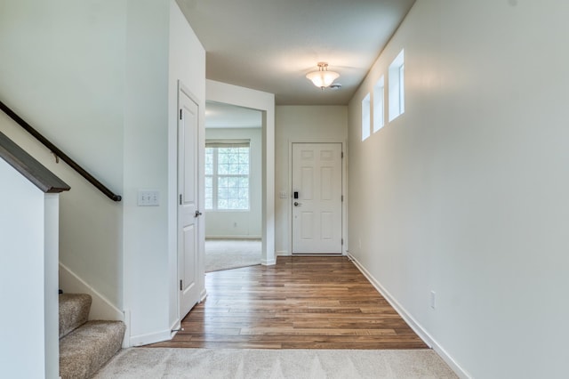 15637 Eddy Creek Way, Apple Valley, MN 55124 - entryway with stairs, healthy amount of natural light, wood finished floors, and baseboards