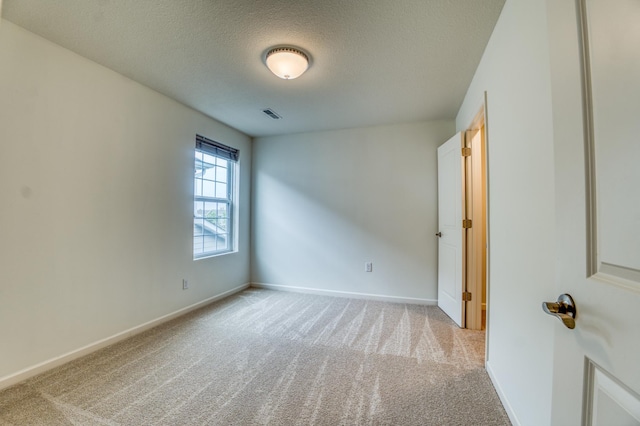 15637 Eddy Creek Way, Apple Valley, MN 55124 - unfurnished room featuring carpet flooring, a textured ceiling, and baseboards