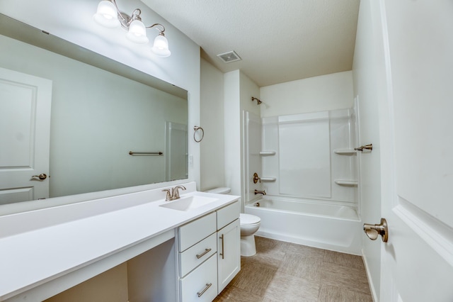 15637 Eddy Creek Way, Apple Valley, MN 55124 - bathroom with toilet, vanity, washtub / shower combination, tile patterned floors, and a textured ceiling