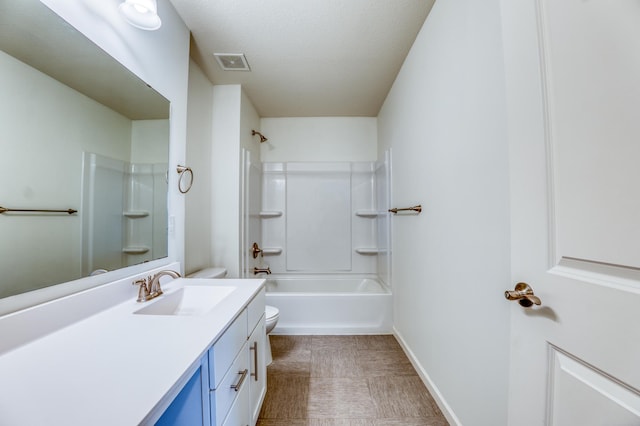 15637 Eddy Creek Way, Apple Valley, MN 55124 - full bath with toilet, vanity, shower / bath combination, a textured ceiling, and baseboards