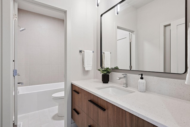 full bath featuring vanity, tile patterned flooring, toilet, and shower / tub combination