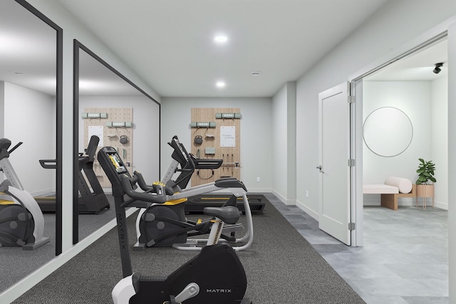 exercise room featuring recessed lighting