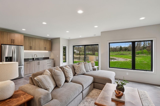 living room featuring recessed lighting and wet bar