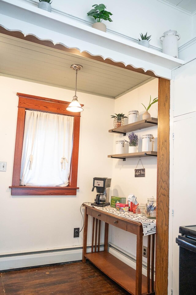 560 7th St, Red Wing, MN 55066 - bar featuring a baseboard heating unit, stove, dark wood-style floors, and decorative light fixtures
