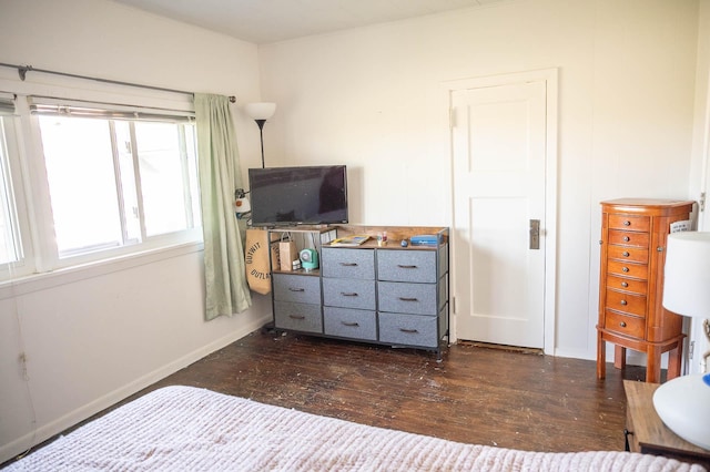 560 7th St, Red Wing, MN 55066 - bedroom featuring dark wood-type flooring and baseboards