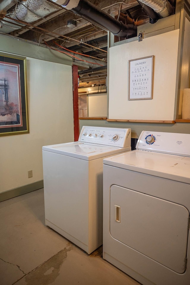 560 7th St, Red Wing, MN 55066 - clothes washing area with separate washer and dryer, laundry area, and baseboards