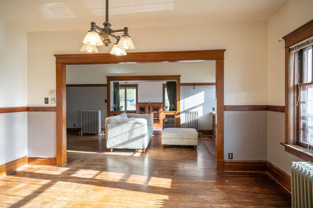 560 7th St, Red Wing, MN 55066 - interior space with radiator and wood finished floors