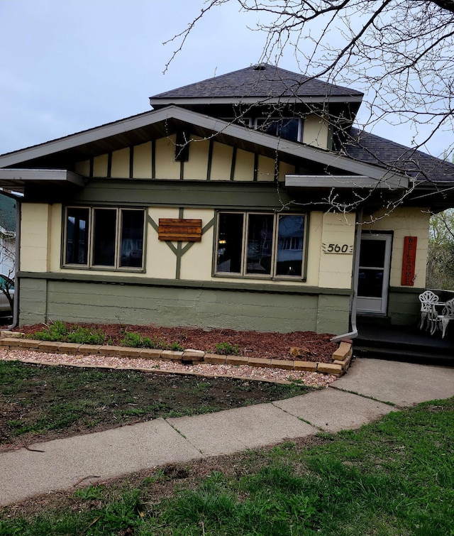 560 7th St, Red Wing, MN 55066 - view of front of home featuring roof with shingles and concrete block siding