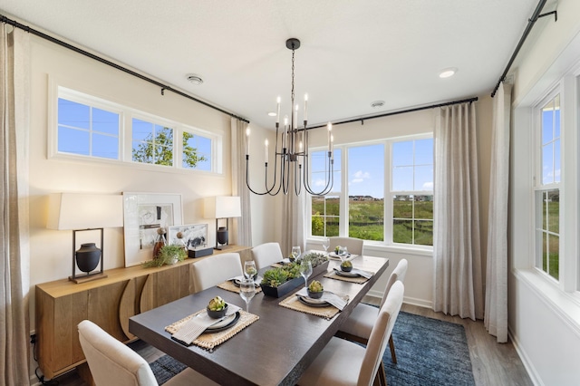 11280 Niagara Ln N, Dayton, MN 55369 - dining space with a chandelier, plenty of natural light, wood finished floors, recessed lighting, and baseboards