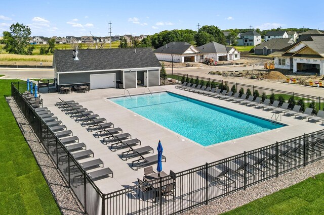 11280 Niagara Ln N, Dayton, MN 55369 - community pool featuring fence, a residential view, and a patio area