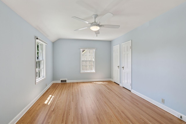 5620 Stevens Ave, Minneapolis, MN 55419 - empty room with a ceiling fan, light wood-style flooring, and vaulted ceiling