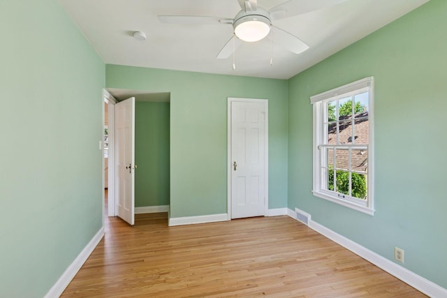 5620 Stevens Ave, Minneapolis, MN 55419 - unfurnished bedroom with light wood-style floors and a ceiling fan