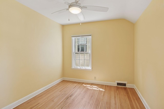 5620 Stevens Ave, Minneapolis, MN 55419 - empty room with light wood finished floors, a ceiling fan, and vaulted ceiling