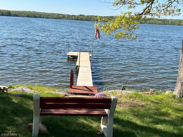 1219 Shore Dr, Luck, WI 54853 - dock area featuring a water view