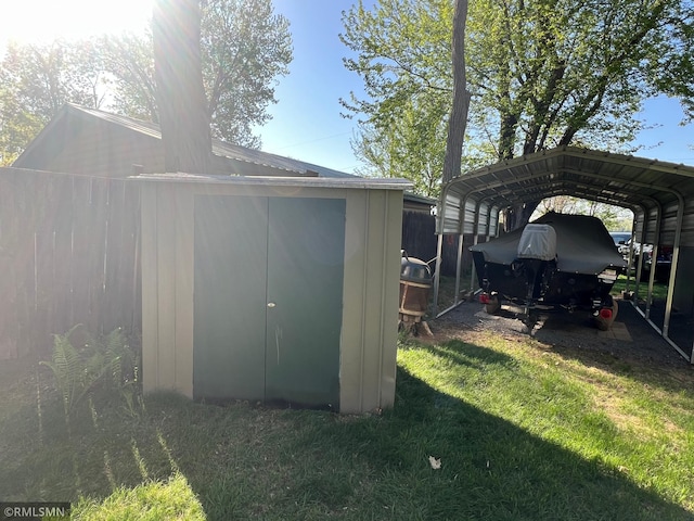 1219 Shore Dr, Luck, WI 54853 - view of shed with a detached carport