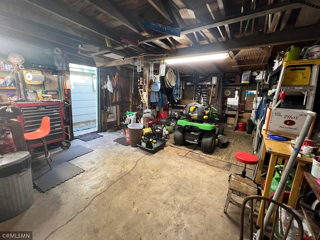 1219 Shore Dr, Luck, WI 54853 - garage with a workshop area