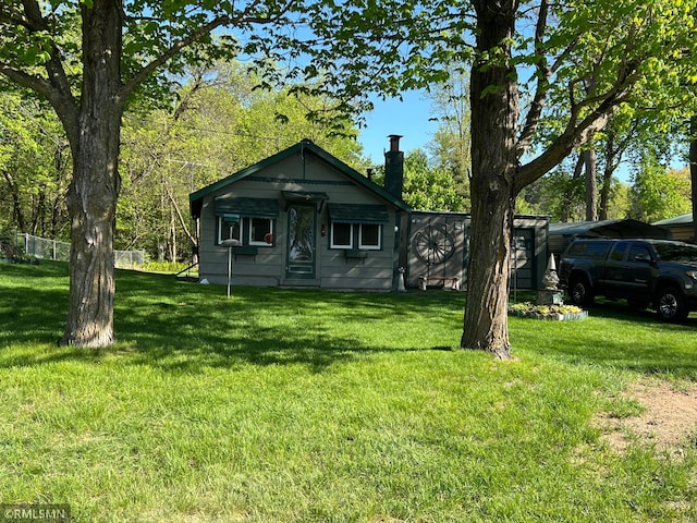 1219 Shore Dr, Luck, WI 54853 - back of property featuring a lawn