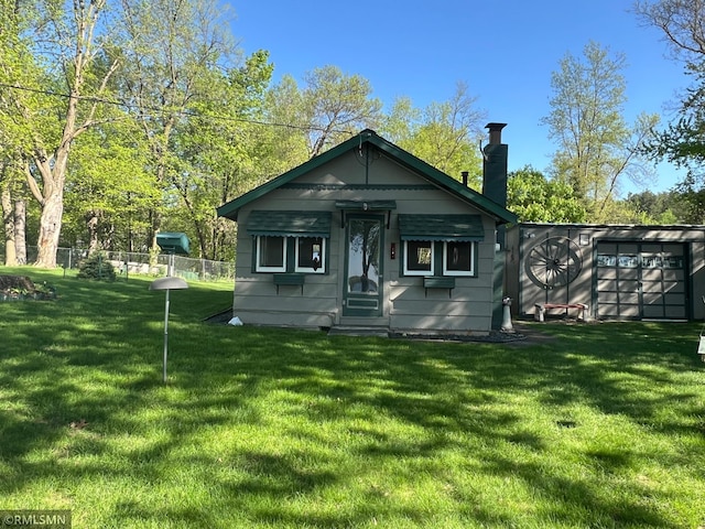 1219 Shore Dr, Luck, WI 54853 - back of property featuring a chimney and entry steps