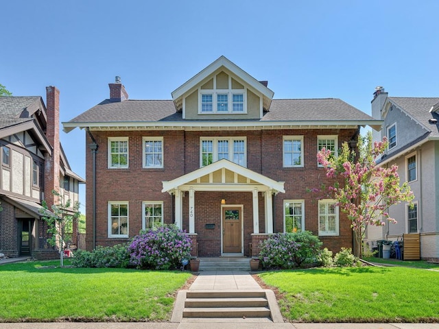 760 Linwood Ave, Saint Paul, MN 55105 - colonial inspired home with a front yard and brick siding