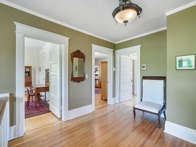 760 Linwood Ave, Saint Paul, MN 55105 - sitting room with light wood-type flooring, baseboards, and crown molding