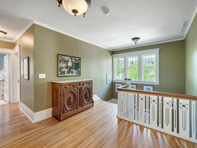 760 Linwood Ave, Saint Paul, MN 55105 - hall featuring wood finished floors, baseboards, and ornamental molding