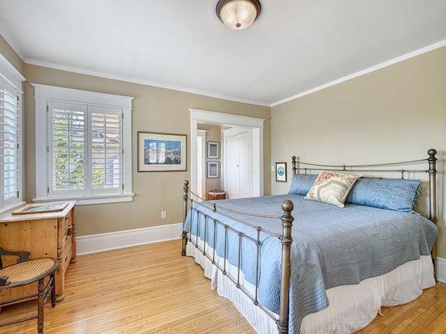 760 Linwood Ave, Saint Paul, MN 55105 - bedroom featuring light wood-style flooring, ornamental molding, and baseboards