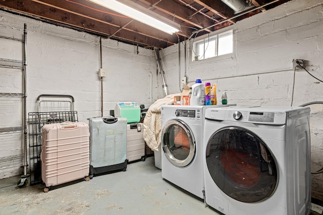clothes washing area featuring laundry area and independent washer and dryer