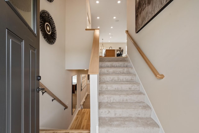 6758 Wildflower Way, Minnetrista, MN 55331 - staircase featuring recessed lighting and wood finished floors
