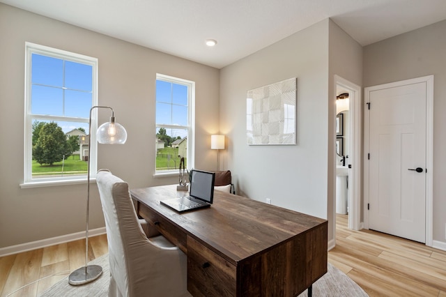 6758 Wildflower Way, Minnetrista, MN 55331 - office space with light wood-style flooring and baseboards