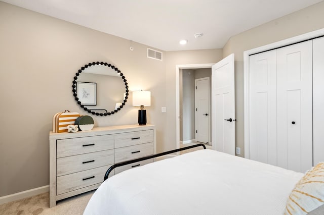 6758 Wildflower Way, Minnetrista, MN 55331 - bedroom with baseboards, light colored carpet, a closet, and recessed lighting