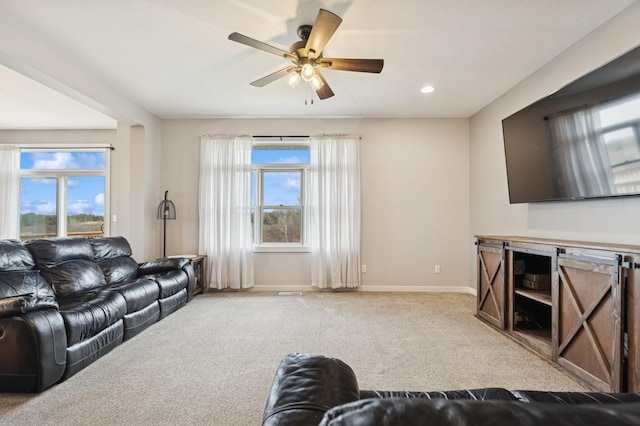 10610 275th Ave NW, Zimmerman, MN 55398 - carpeted living area featuring ceiling fan, baseboards, and recessed lighting
